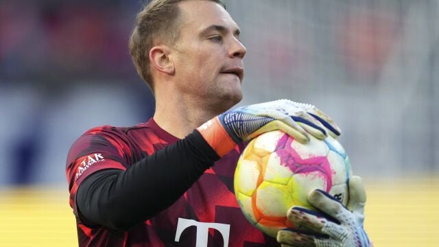 Bayern's goalkeeper Manuel Neuer holds the ball prior to the German Bundesliga soccer match between Hertha BSC Berlin and FC Bayern Munich in Berlin, Germany,
