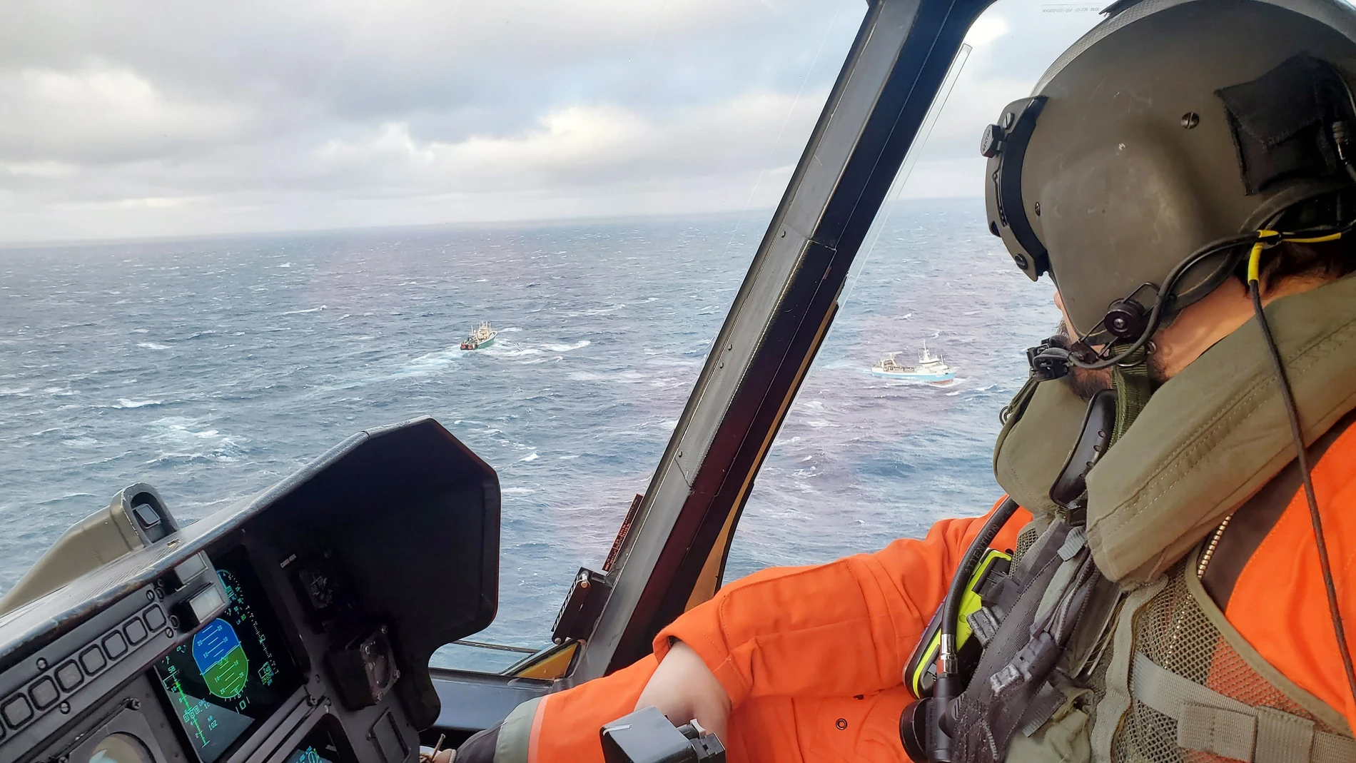 A handout photo made available by the Canadian Joint Operations Command Joint Task Force (Atlantic) and Joint Rescue Coordination Centre showing a helicopter pilot as rescue and recovery efforts continue in the Grand Bank following the sinking of the Spanish fishing vessel Villa de Pitanxo off Newfoundland, Canada,
