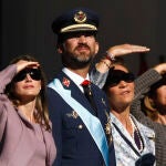 Members of the Spanish royal family (L-R) Princess Letizia, Crown Prince Felipe, Infanta Elena, Infanta Cristina and King Juan Carlos watch a military parade during Spain's National Day in Madrid October 12, 2009.