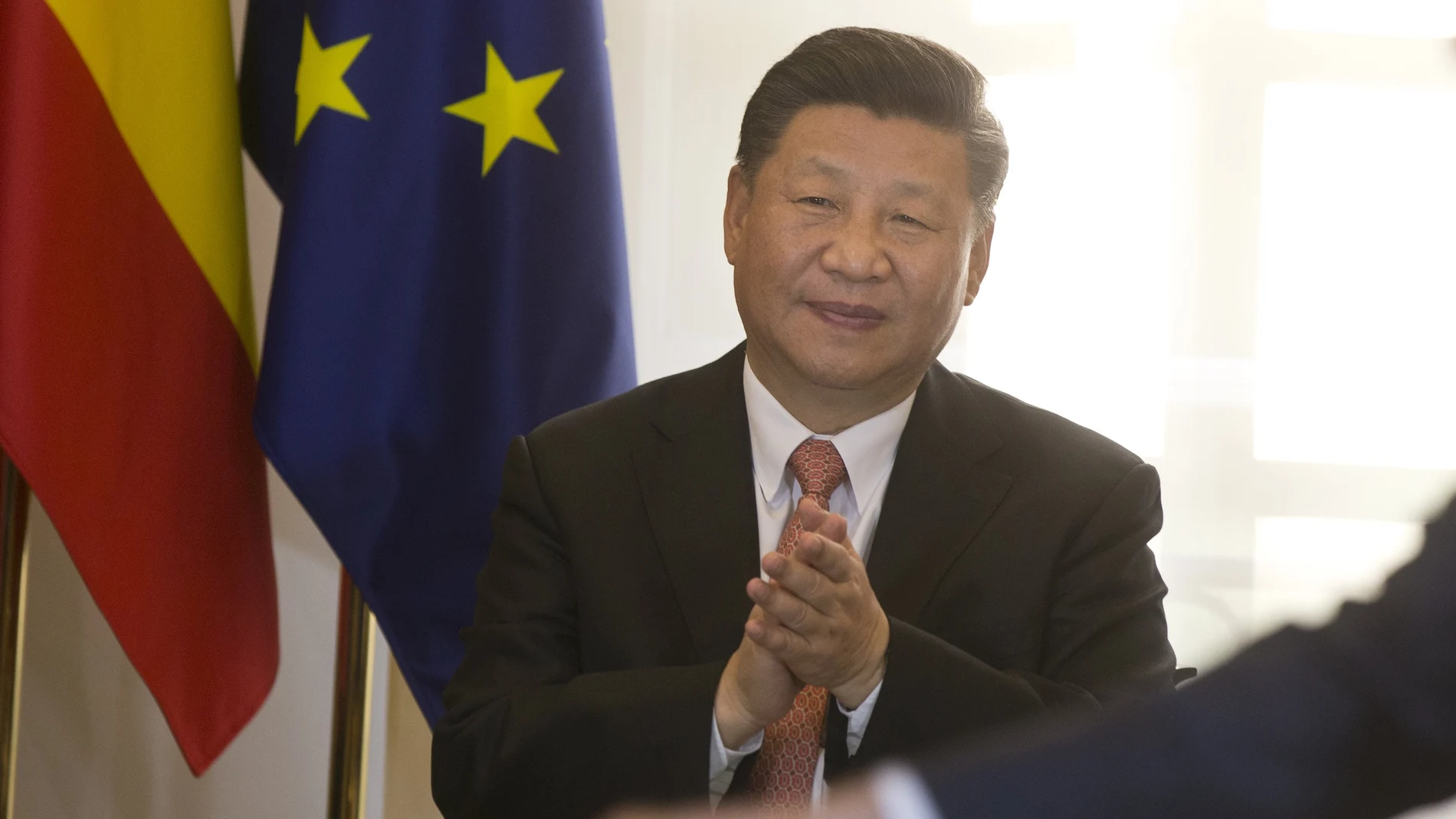 Chinese President Xi Jinping applauds during a signing ceremony with Spain at the Moncloa Palace in Madrid, Spain.