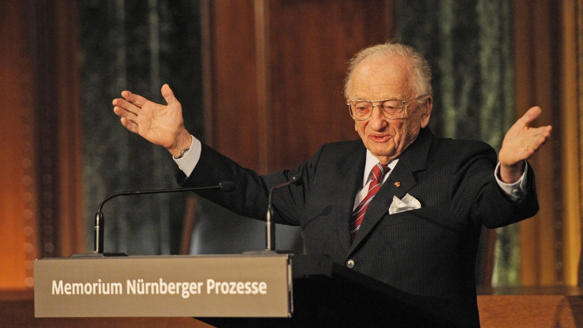 FILE - Benjamin Ferencz, Romanian-born American lawyer and chief prosecutor of the Nuremberg war crimes trials, speaks during an opening ceremony for the exhibition commemorating the Nuremberg war crimes trials in Nuremberg, Germany, Sunday, Nov. 21, 2010. Ferencz, the last living prosecutor from the Nuremberg trials, who tried Nazis for genocidal war crimes and was one of the first outside witnesses to document the atrocities of Nazi labor and concentration camps as a U.S. Army soldier, died Friday evening, April 7, 2023, in Boynton Beach, Fla.,, according to St. John's University law professor John Barrett, who runs a blog about the Nuremberg trials. He had just turned 103 in March. (Armin Weigel/Pool Photo via AP, File)