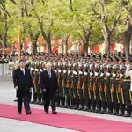 Chinese President Xi Jinping (L) and Brazil's President Luiz Inacio Lula da Silva review a guard of honor during a welcome ceremony at the Great Hall of the People in Beijing, China, 14 April 2023