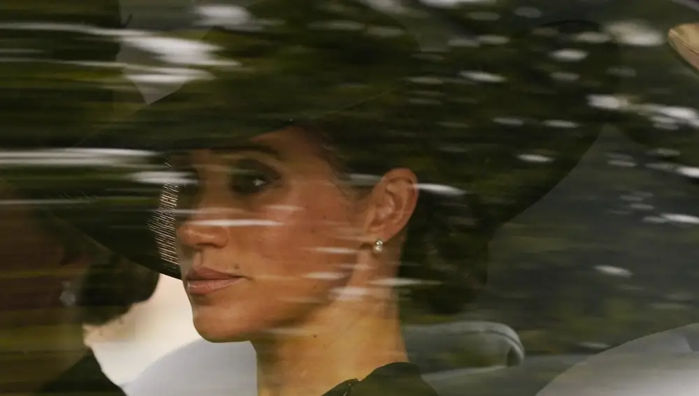 Meghan, the Duchess of Sussex, is driven following the coffin of Queen Elizabeth II carried after her funeral service in Westminster Abbey, in central London Monday Sept. 19, 2022
