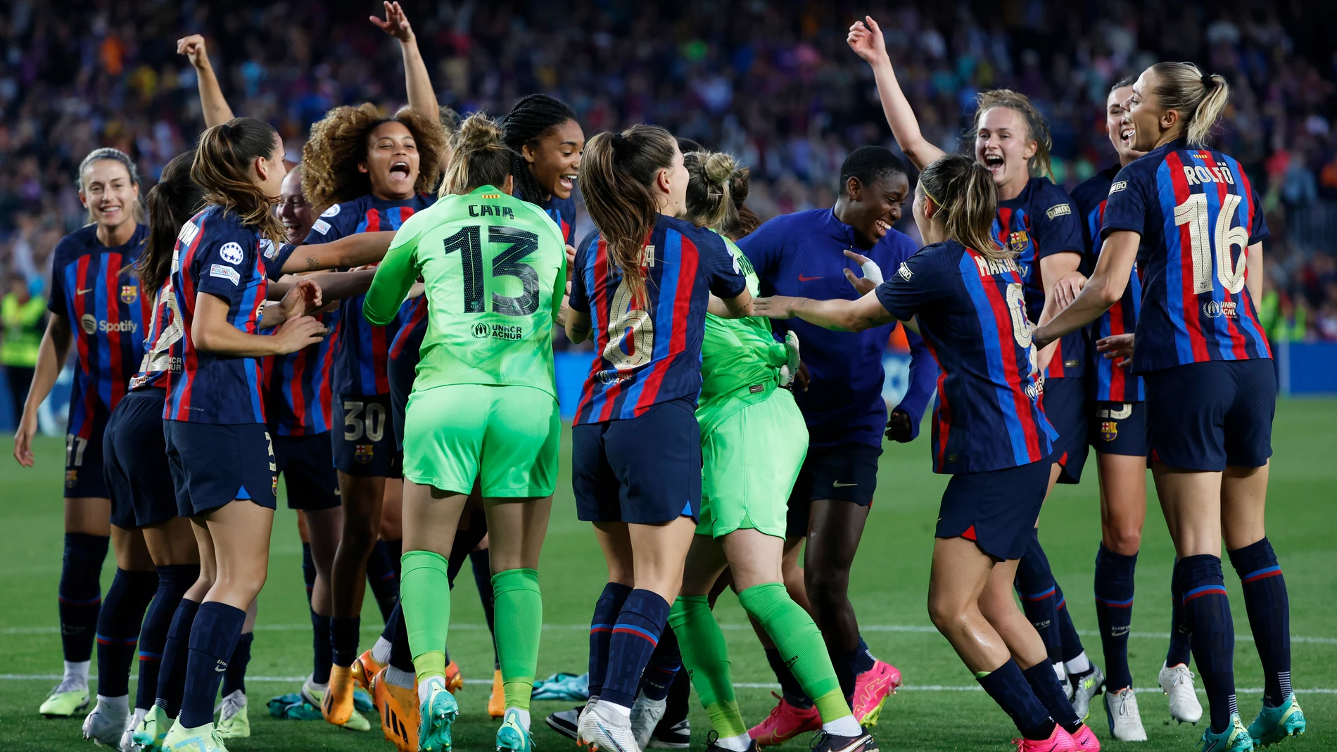 Barcelona players celebrate at the end of the Women's Champions League semifinal, second leg, soccer match between FC Barcelona and Chelsea FC at the Camp Nou stadium in Barcelona, Spain, Thursday, April 27, 2023. The match ended in a 1-1 draw but Barcelona advance on a 2-1 aggregate. (AP Photo/Joan Monfort)
