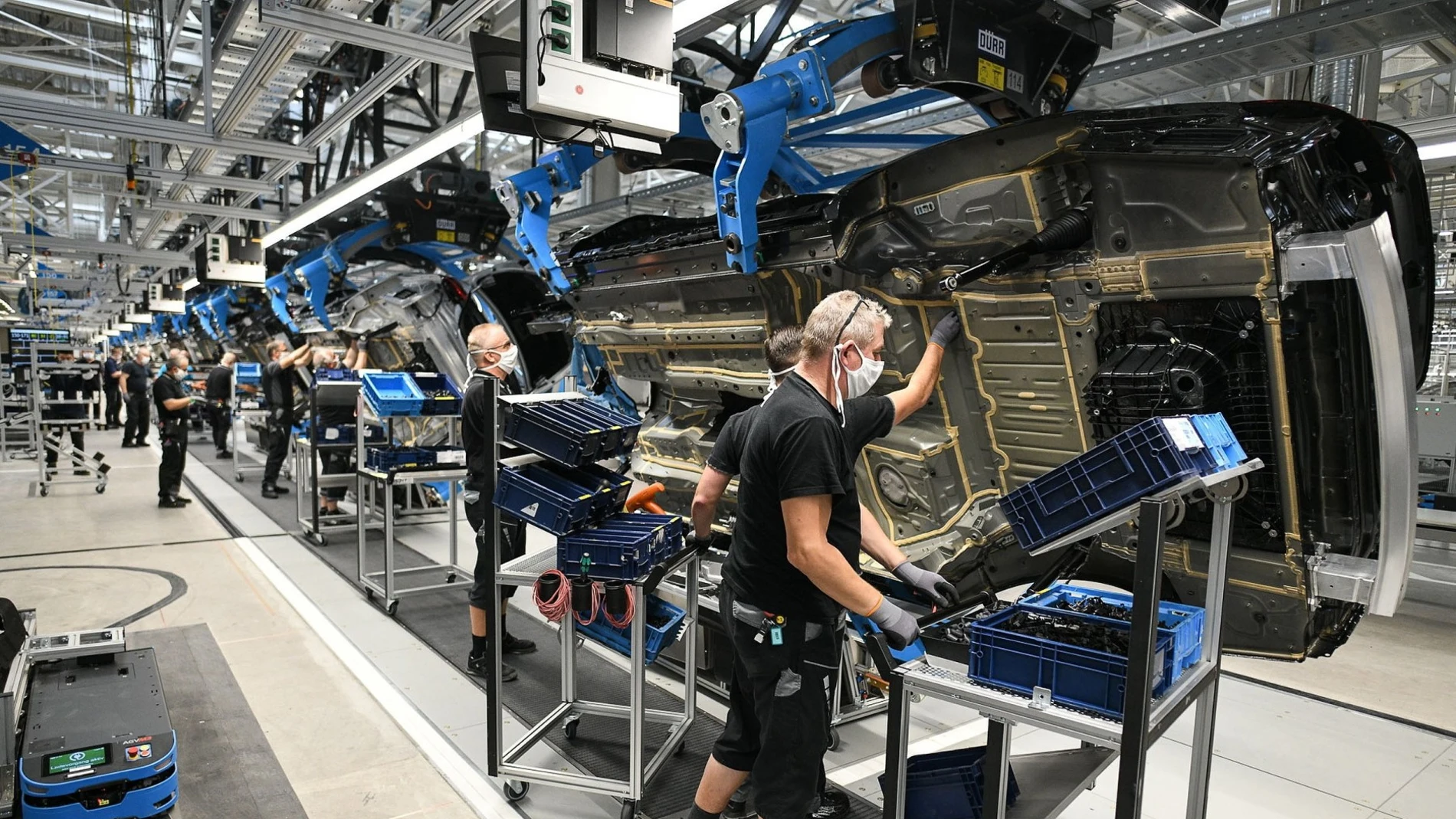 Workers assemble the new Mercedes S-class during a press event for the opening of the Factory 56 production slated line in Sindelfingen, Germany.