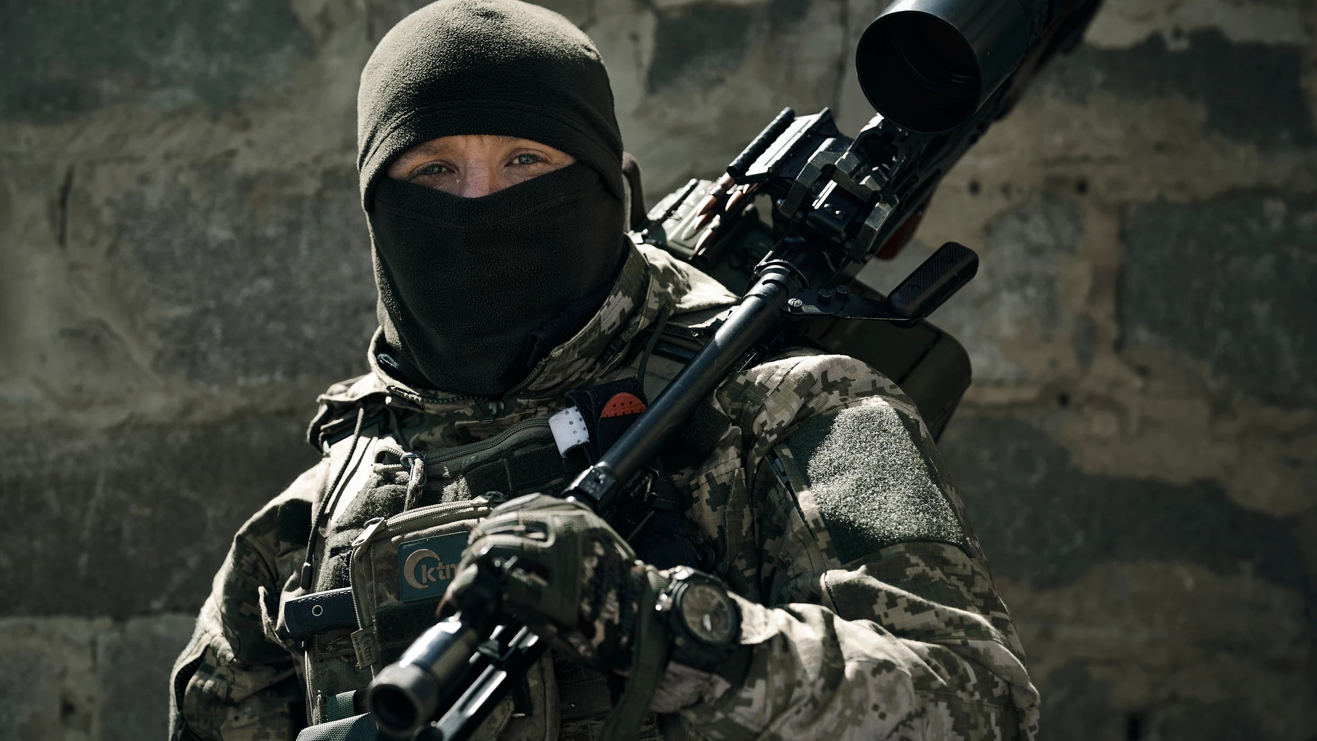 A Ukrainian army sniper looks on near Bakhmut, Donetsk region, Ukraine, Tuesday, May 2, 2023. (AP Photo/Libkos)