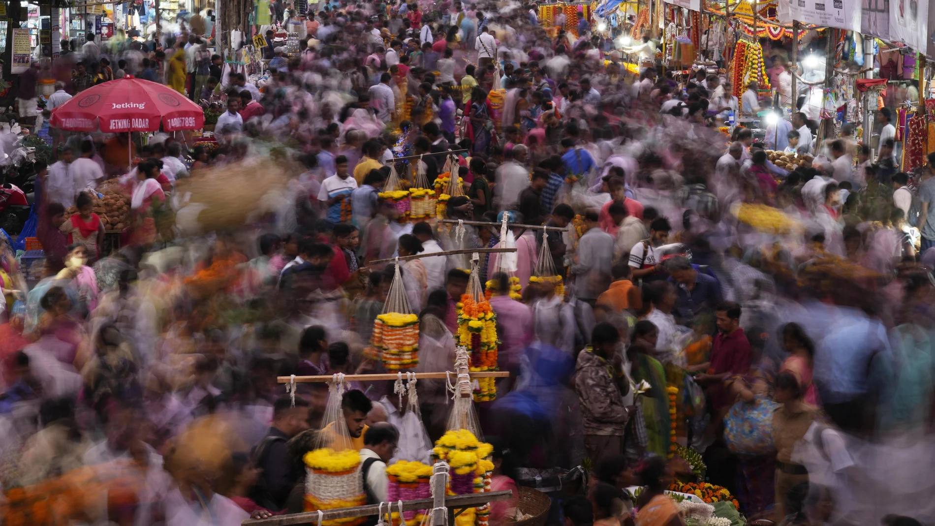 FILE - People crowd a market on the eve of of Dussehra festival in Mumbai, India, Oct. 4, 2022. Demographers are unsure exactly when India will take the title as the most populous nation in the world because they're relying on estimates to make their best guess.
