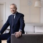 French Minister for the Economy and Finances Bruno Le Maire poses during a photo session at his home in Paris on April 27, 2023. 