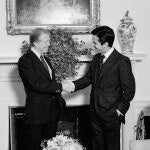 President Jimmy Carter shakes hands with Spanish Premier Adolfo Suarez in the White House Oval Office, April 29, 1977. Carter spoke in both English and Spanish as he greeted the visiting leader.