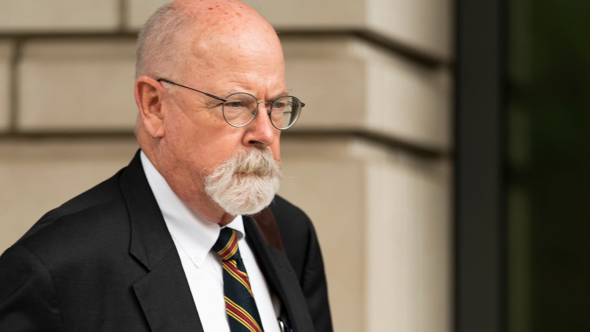 FILE - Special counsel John Durham, the prosecutor appointed to investigate potential government wrongdoing in the early days of the Trump-Russia probe, leaves federal court in Washington, May 16, 2022. Durham ended his four-year investigation into possible FBI misconduct in its probe of ties between Russia and Donald Trump’s 2016 presidential campaign. The report Monday, May 15, 2023, from Durham offers withering criticism of the bureau but a meager court record that fell far short of the former president’s prediction he would uncover the “crime of the century.” (AP Photo/Manuel Balce Ceneta, File)