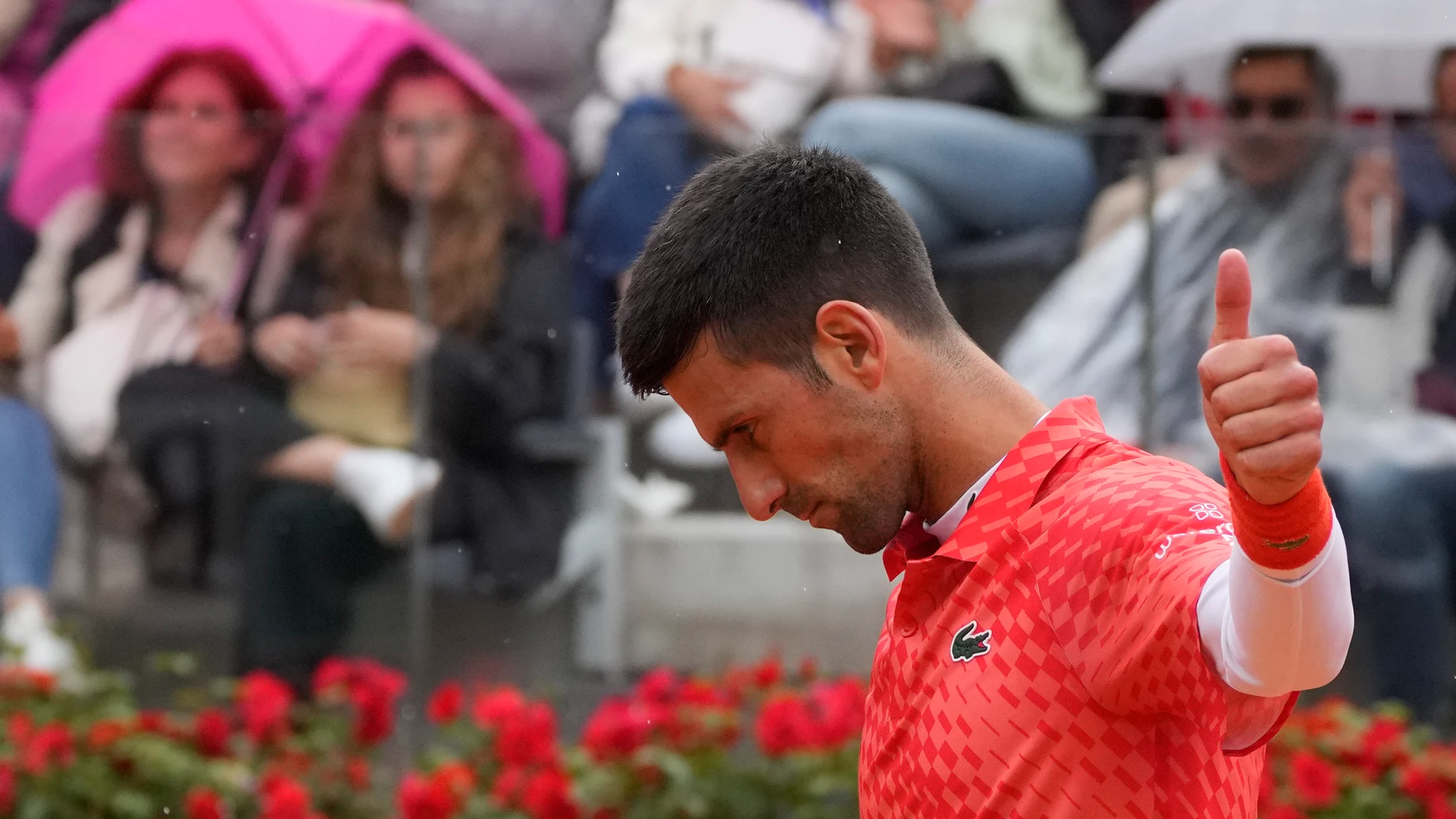 Serbia's Novak Djokovic gestures during the quarter final match against Denmark's Holger Rune at the Italian Open tennis tournament, in Rome, Wednesday, May 17, 2023. (AP Photo/Gregorio Borgia)