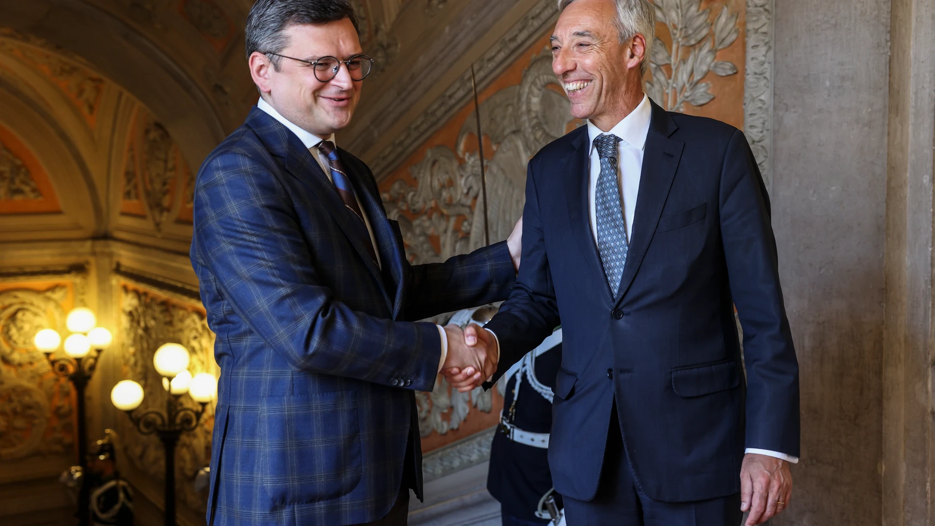 Lisbon (Portugal), 19/05/2023.- Portuguese Foreign Affairs Minister Joao Gomes Cravinho (R) welcomes his Ukrainian counterpart Dmytro Kuleba (L), during their meeting at the Necessidades Palace in Lisbon, Portugal 19 May 2023. Kuleba is on a working visit to Portugal. (Ucrania, Lisboa) EFE/EPA/MIGUEL A. LOPES 