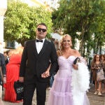 Belén Esteban y Miguel Marcos como invitados de boda.