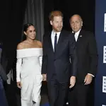 Meghan, Duchess of Sussex, left, and Prince Harry, center, attend the Robert F. Kennedy Human Rights Ripple of Hope Awards Gala at the New York Hilton Midtown