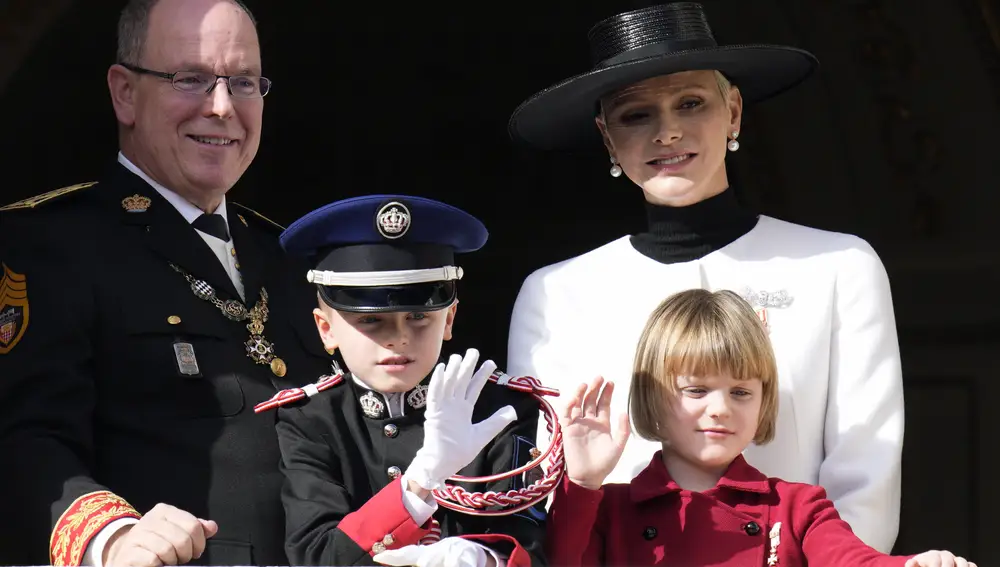 Prince Albert II of Monaco and Princess Charlene, right, stand with their children Prince Jacques and Princess Gabriella from the balcony of the Monaco Palace during ceremonies marking National Day, in Monaco.