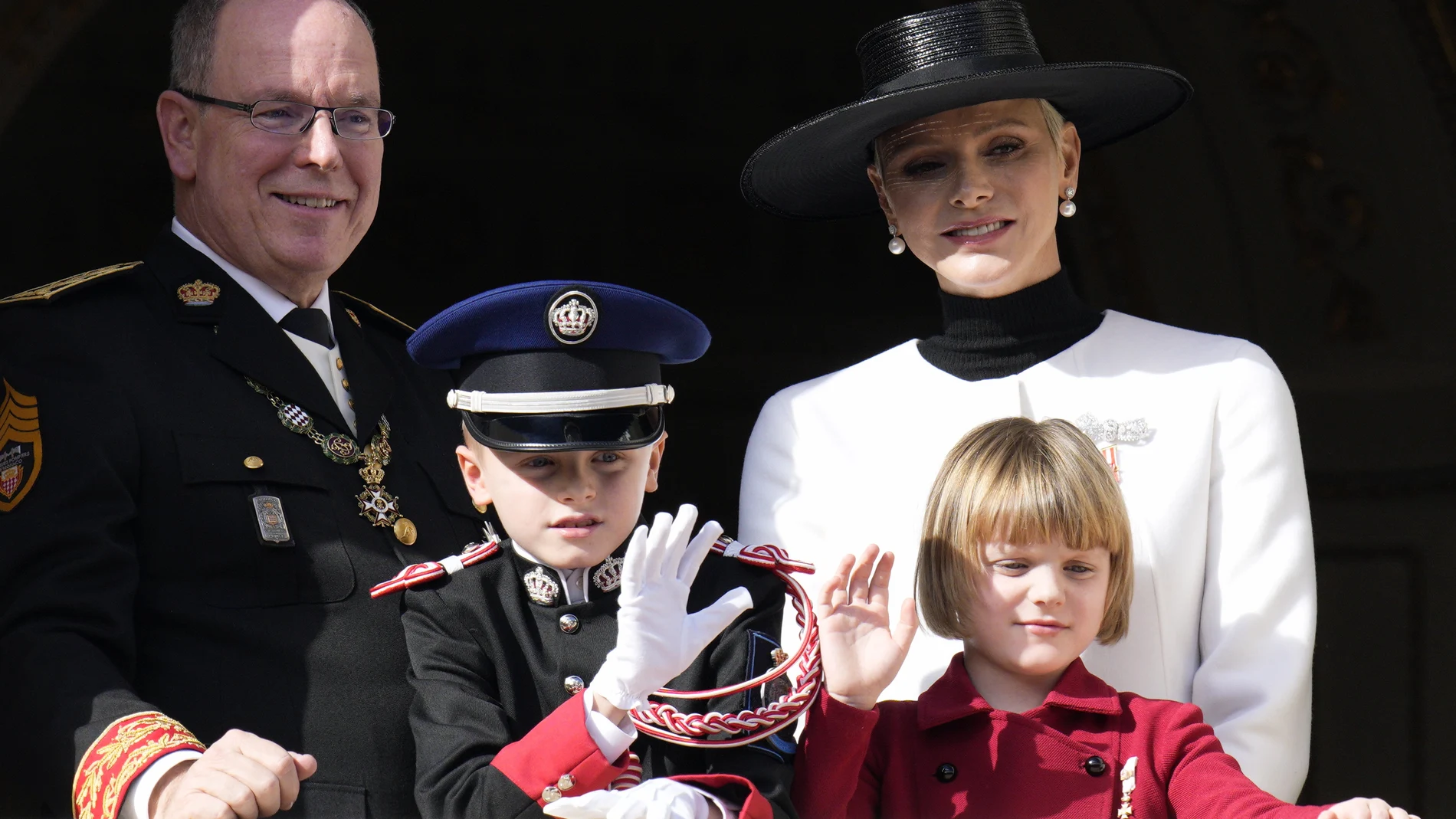 Prince Albert II of Monaco and Princess Charlene, right, stand with their children Prince Jacques and Princess Gabriella from the balcony of the Monaco Palace during ceremonies marking National Day, in Monaco.
