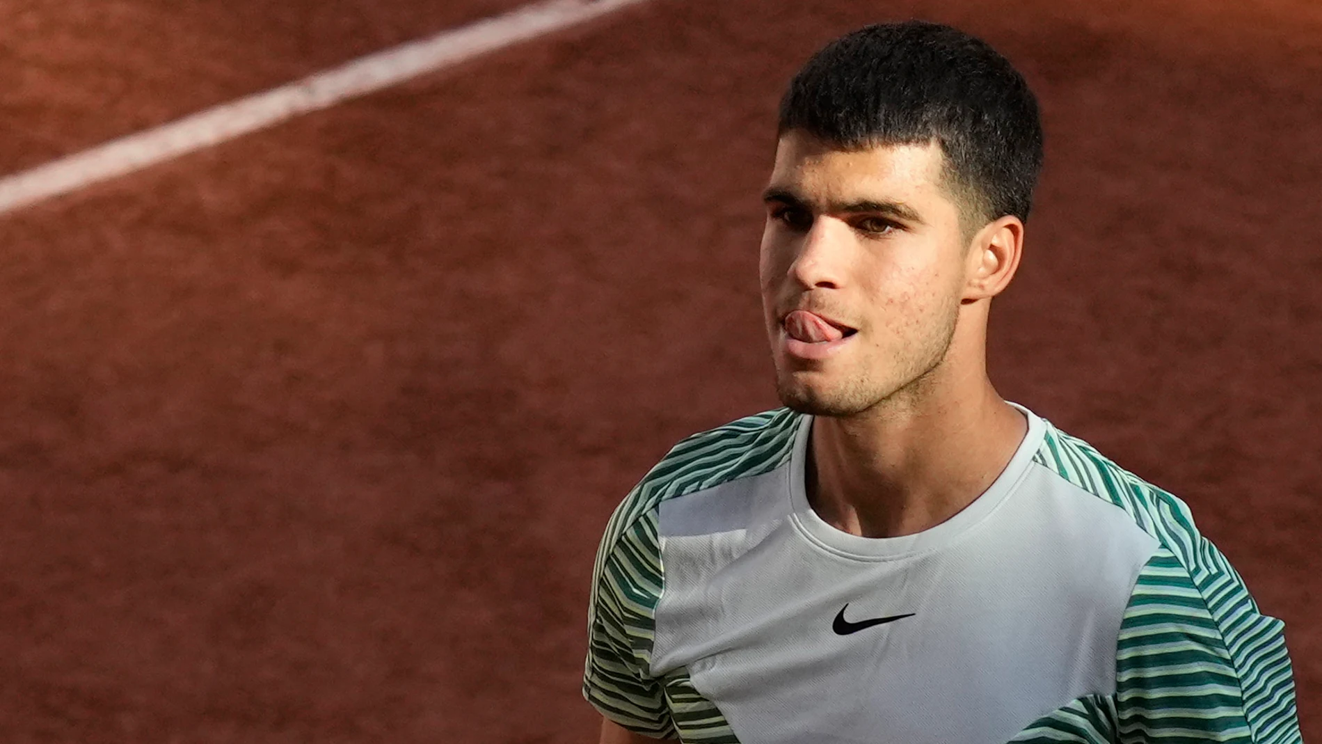 Spain's Carlos Alcaraz reacts after winning his second round match of the French Open tennis tournament against Japan's Taro Daniel, at the Roland Garros stadium in Paris, Wednesday, May 31, 2023. (AP Photo/Thibault Camus)