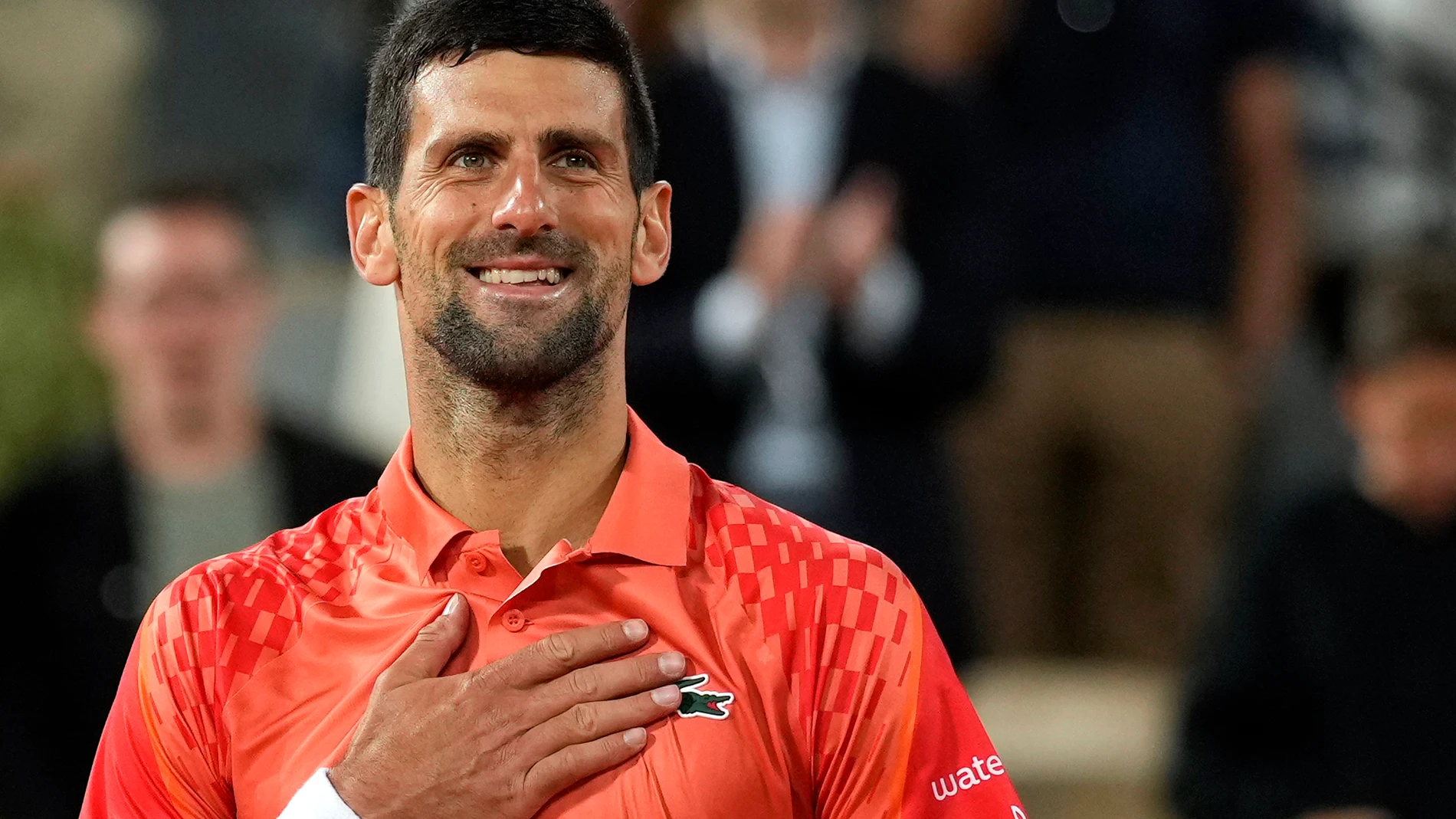 Serbia's Novak Djokovic celebrates after beating Hungary's Marton Fucsovics during their second round match of the French Open tennis tournament at the Roland Garros stadium in Paris, Wednesday, May 31, 2023. (AP Photo/Thibault Camus)