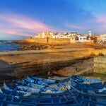 Fishing port and Essaouira town at the sunset time, Morocco