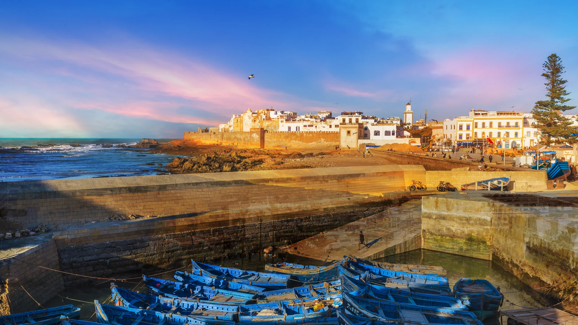 Fishing port and Essaouira town at the sunset time, Morocco