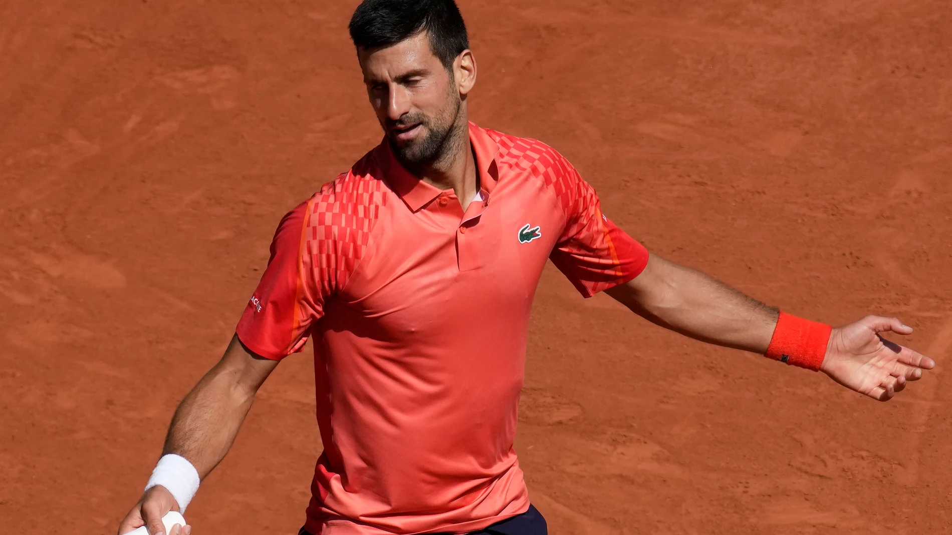 Serbia's Novak Djokovic reacts during his third round match of the French Open tennis tournament against Spain's Alejandro Davidovich Fokina, at the Roland Garros stadium in Paris, Friday, June 2, 2023. (AP Photo/Christophe Ena)