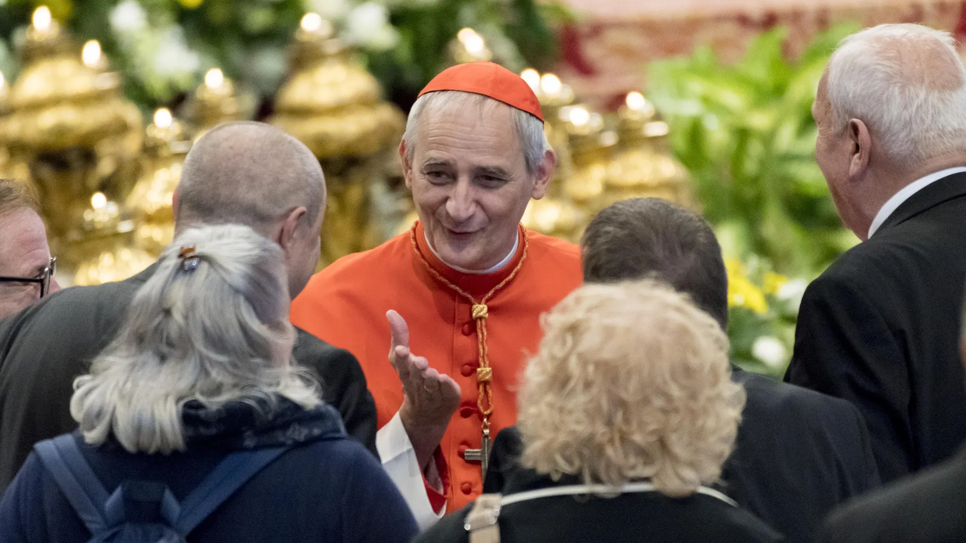 New cardinal Matteo Maria Zuppi (C) attends Pope Francis' opening Mass for the Amazon synod, in St. Peter's Basilica, at the Vatican, Sunday, Oct. 6, 2019. 