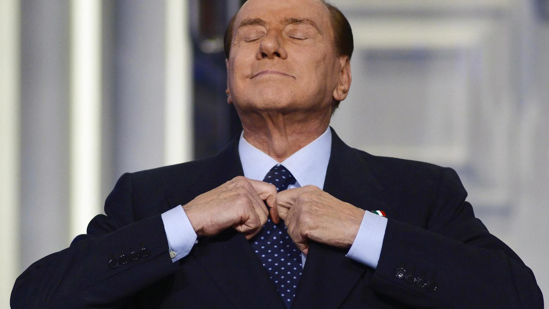 Rome (Italy), 18/12/2012.- (FILE) Former Italian Prime Minister Silvio Berlusconi adjusting his tie during the recording of the Italian Rai 1 television program 'Porta a porta', in Rome, Italy, 18 December 2012 (reissued 12 June 2023). Silvio Berlusconi has died at the age of 86 on 12 June 2023 at San Raffaele hospital in Milan, where he was hospitalized again since last 09 June, sources close to his family told ANSA. The Italian media tycoon and Forza Italia (FI) party founder served as prim...
