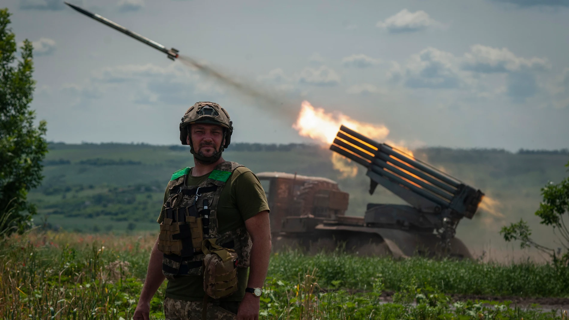 A Ukrainian MSLR BM-21 "Grad" fires towards Russian positions, near Bakhmut at the frontline in Donetsk region, Ukraine, Wednesday, June 21, 2023. (Iryna Rybakova via AP)