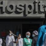 Medical staff and nurses wearing face masks to prevent the spread of coronavirus at La Paz hospital in Madrid,