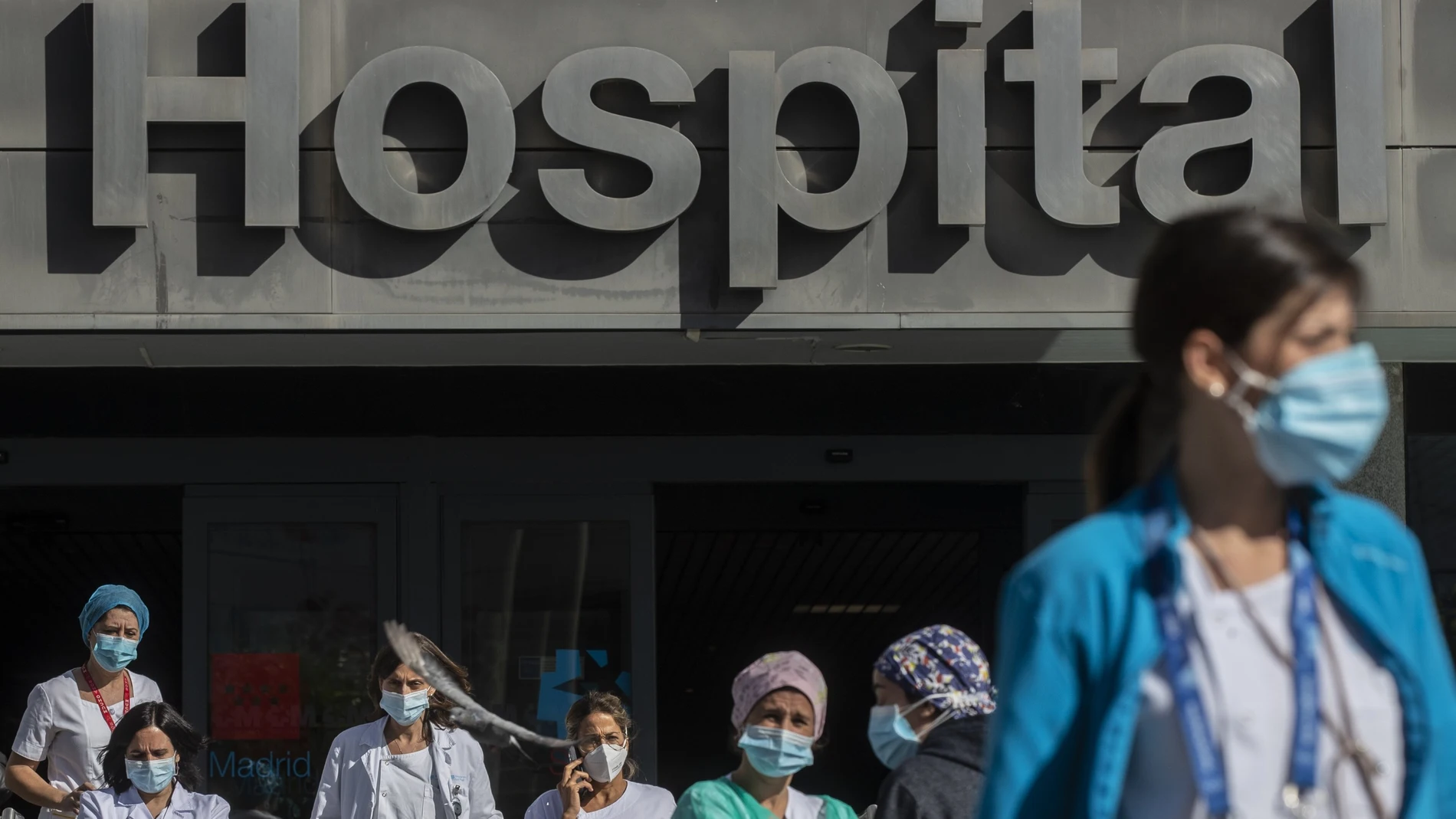 Medical staff and nurses wearing face masks to prevent the spread of coronavirus at La Paz hospital in Madrid,