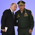 Russian President Vladimir Putin (L) and Russian Defence Minister Sergei Shoigu (R) attend an opening ceremony of the Army-2022 International Military and Technical Forum and the Army-2022 International military games at the Russian Armed Forces' Patriot Park in Kubinka, Russia, 15 August 2022.