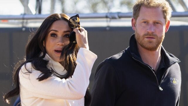 FILE - Prince Harry and Meghan Markle, Duke and Duchess of Sussex visit the track and field event at the Invictus Games in The Hague, Netherlands, Sunday, April 17, 2022. Prince Harry and his wife, Meghan, have been asked to vacate their home in Britain. Frogmore Cottage, located on the grounds of Windsor Castle west of London, had been intended as the coupleís main residence before they gave up royal duties and moved to Southern California. File
