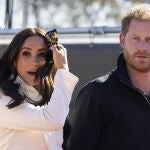 FILE - Prince Harry and Meghan Markle, Duke and Duchess of Sussex visit the track and field event at the Invictus Games in The Hague, Netherlands, Sunday, April 17, 2022. Prince Harry and his wife, Meghan, have been asked to vacate their home in Britain. Frogmore Cottage, located on the grounds of Windsor Castle west of London, had been intended as the coupleís main residence before they gave up royal duties and moved to Southern California. File