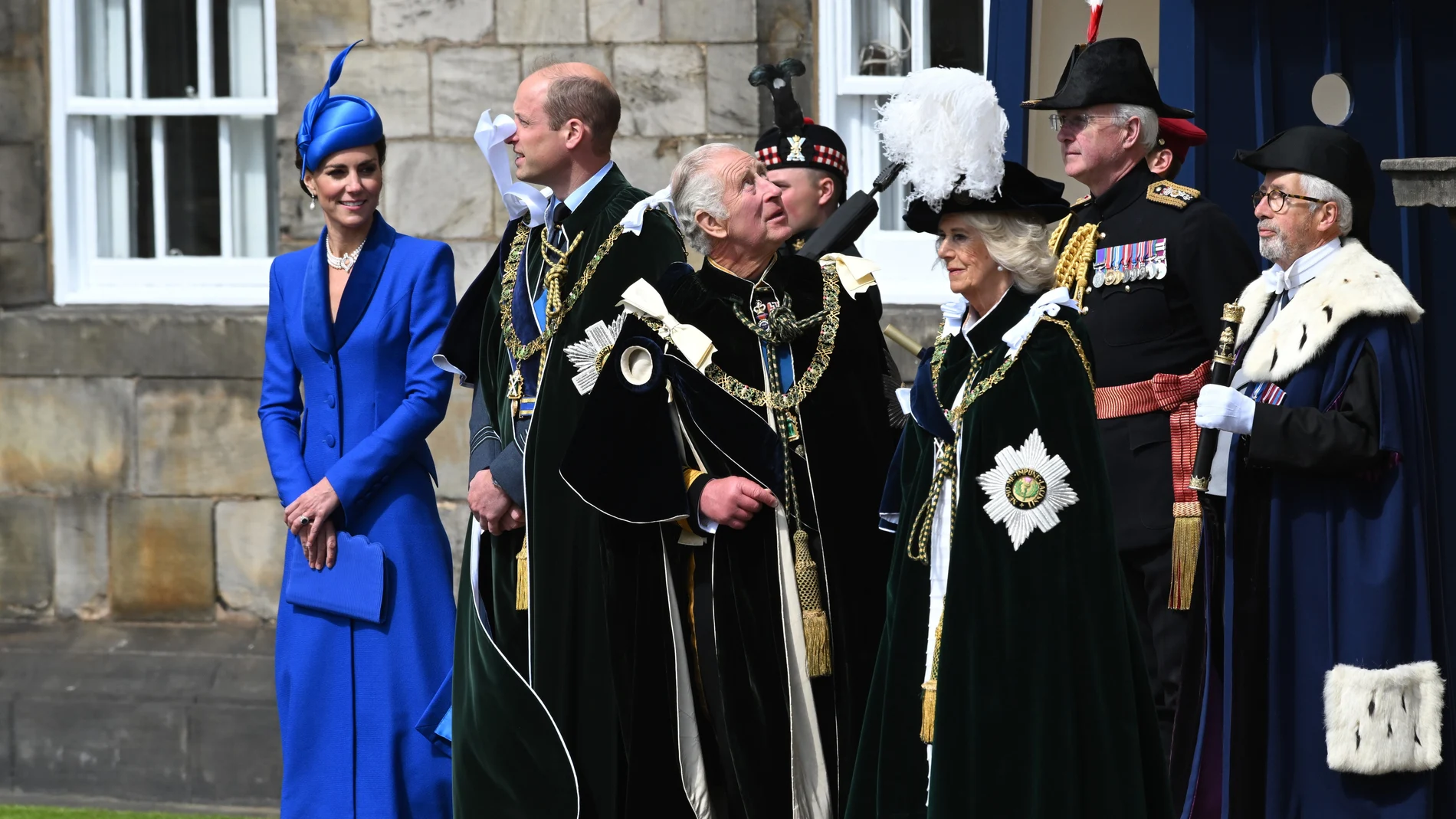 Prince William (2nd L) and Princess Kate (L) of Wales, known as the Duke and Duchess of Rothesay while in Scotland, King Charles III and Queen Camilla (R) watch a fly pass of the RAF over the Palace of Holyroodhouse, after the National Service of Thanksgiving and Dedication for King Charles III and Queen Camilla, and the presentation of the Honours of Scotland. 