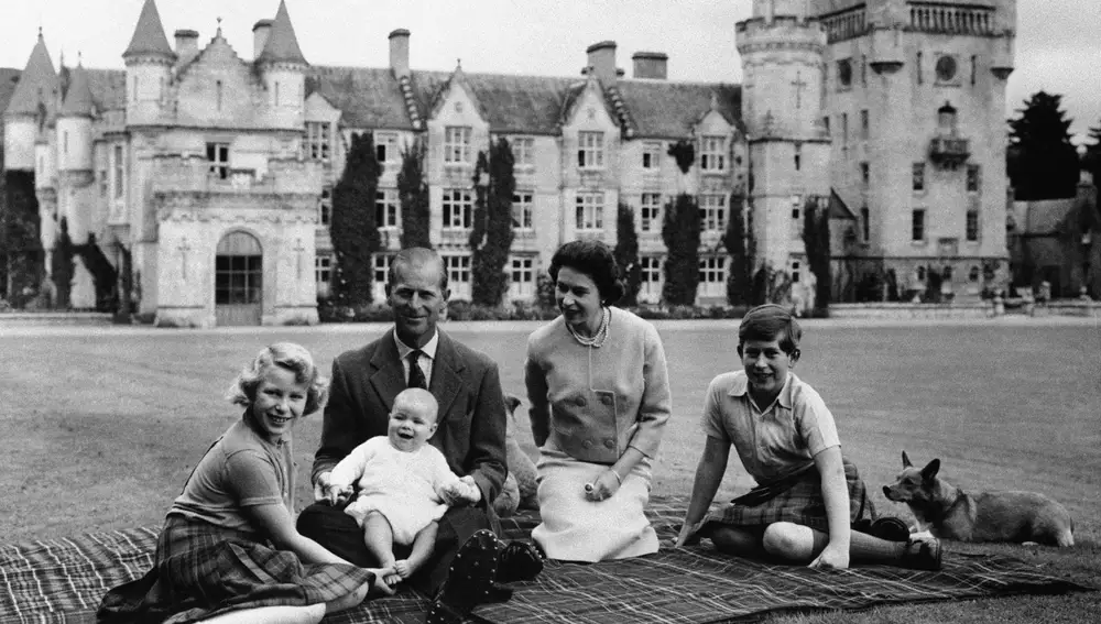 FILE - In this Sept. 1960 file photo, Britain's Queen Elizabeth II, Prince Philip and their children, Prince Charles, right, Princess Anne and Prince Andrew, pose for a photo on the lawn of Balmoral Castle, in Scotland. (AP Photo/File)