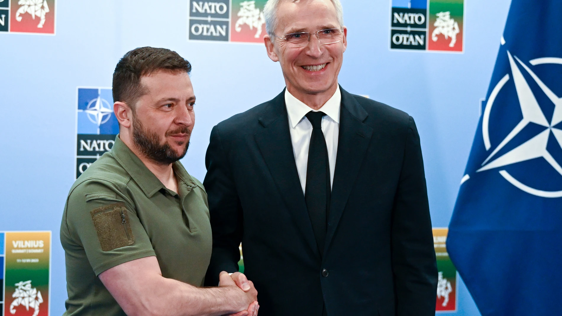 Vilnius (Lithuania), 12/07/2023.- NATO Secretary General Jens Stoltenberg (R) and Ukraine's President Volodymyr Zelensky shake hands before a bilateral meeting, at the NATO ?summit in Vilnius, Lithuania, 12 July 2023. The North Atlantic Treaty Organization (NATO) Summit takes place in Vilnius on 11 and 12 July 2023 with the alliance's leaders expected to adopt new defense plans. (Lituania, Ucrania) EFE/EPA/FILIP SINGER 