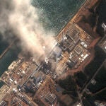 This satellite image provided by DigitalGlobe shows the damaged Fukushima Dai-ichi nuclear facility in Japan on Monday, March 14, 2011. Authorities are strugging to prevent the catastrophic release of radiation in the area devastated by a tsunami. (AP Photo/DigitalGlobe)