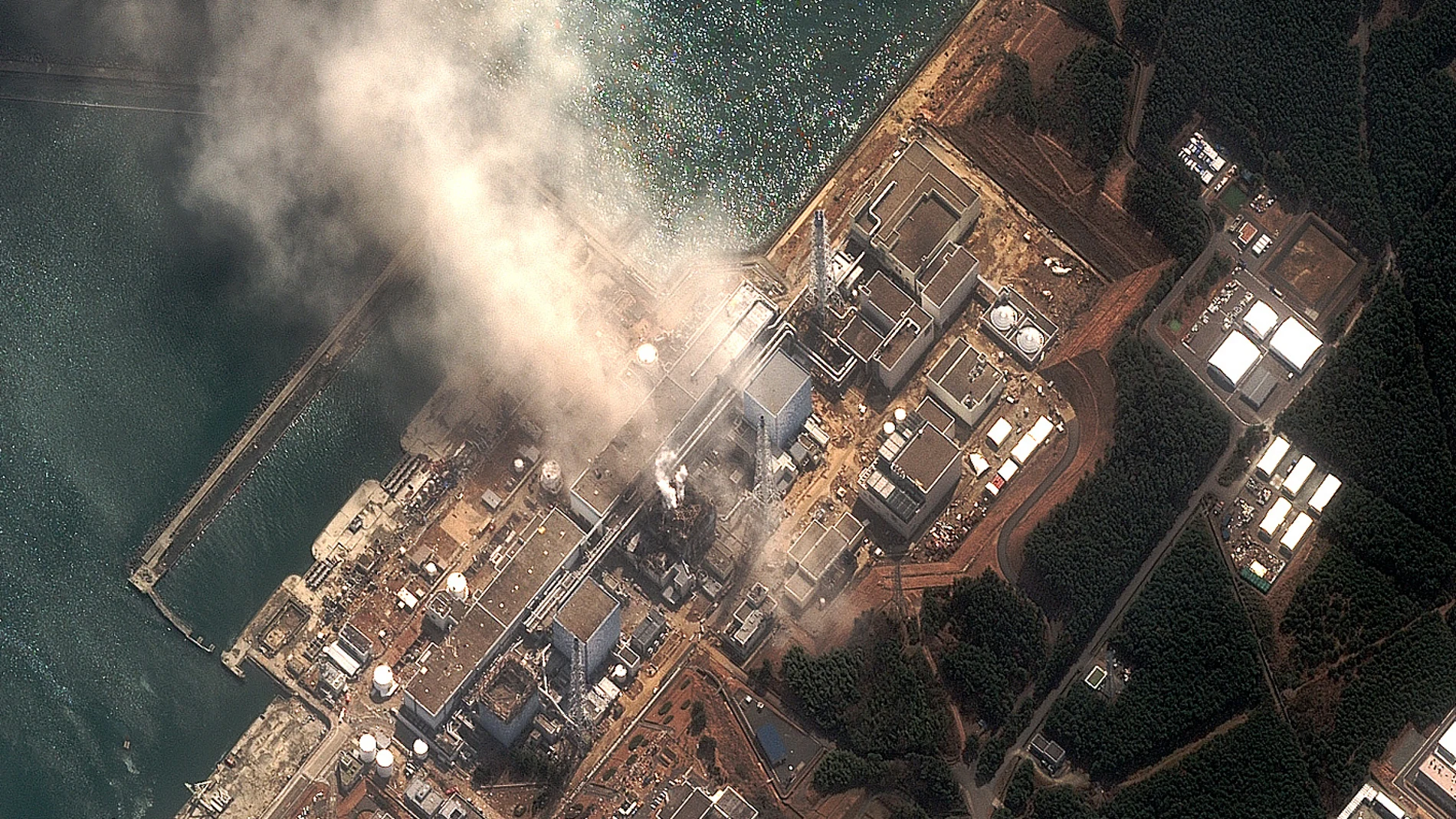 This satellite image provided by DigitalGlobe shows the damaged Fukushima Dai-ichi nuclear facility in Japan on Monday, March 14, 2011. Authorities are strugging to prevent the catastrophic release of radiation in the area devastated by a tsunami. (AP Photo/DigitalGlobe)
