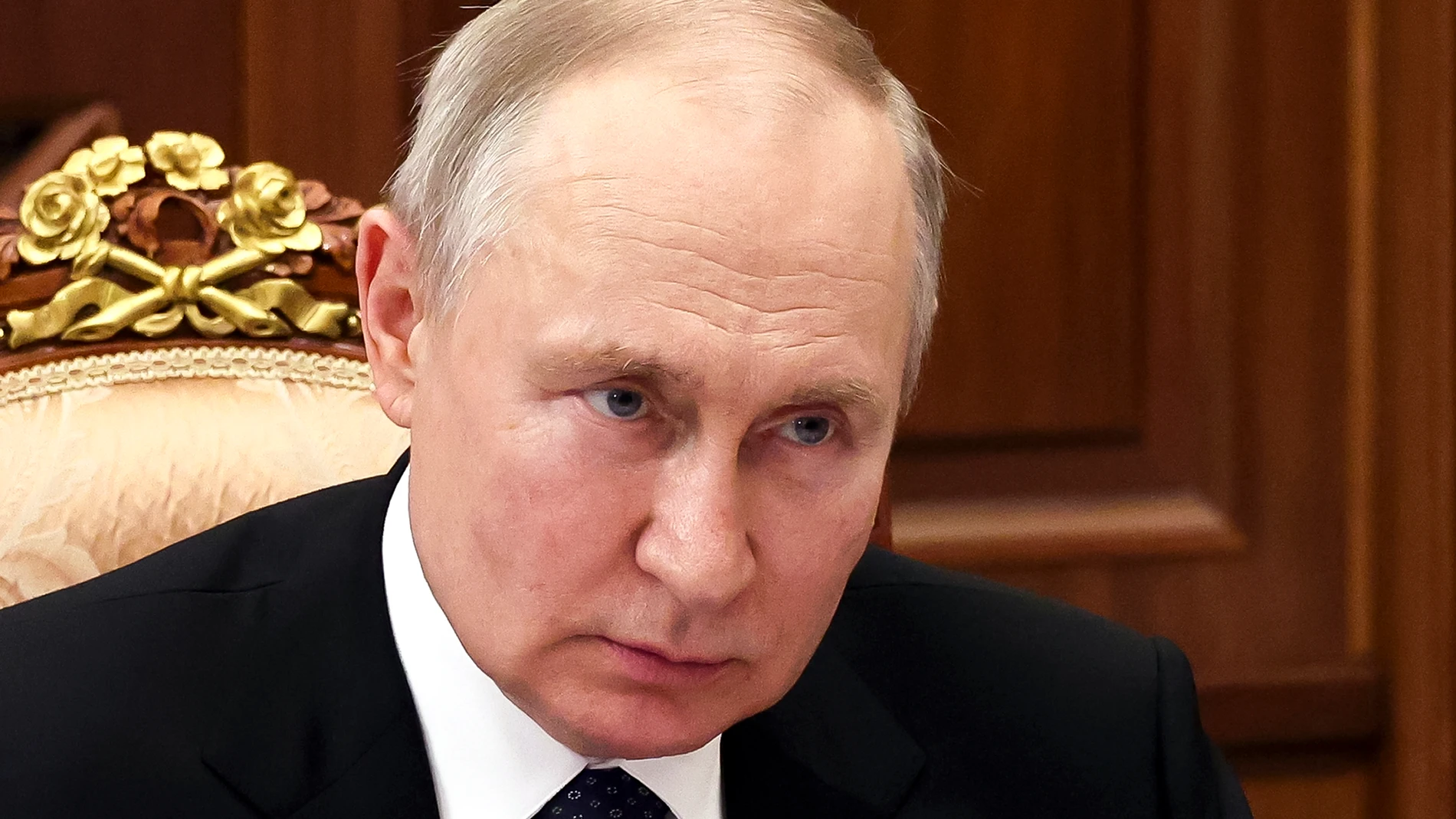 Russian President Vladimir Putin listens to Irkutsk Region Governor Igor Kobzev, in Moscow, Russia, Monday, July 17, 2023. (Alexander Kazakov, Sputnik, Kremlin Pool Photo via AP)
