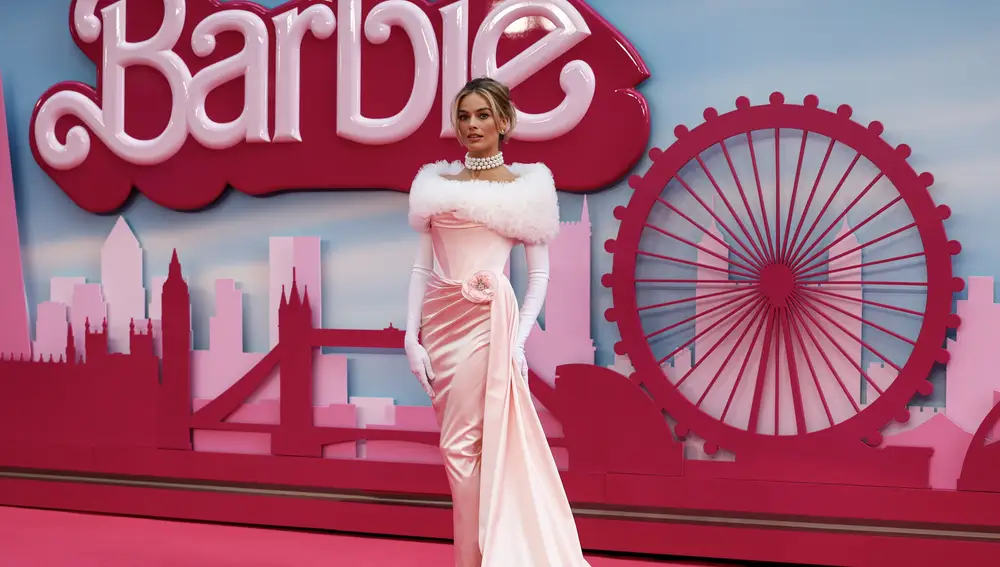 Australian actor Margot Robbie poses on the pink carpet at the European premiere of 'Barbie' in central London