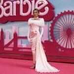 Australian actor Margot Robbie poses on the pink carpet at the European premiere of 'Barbie' in central London