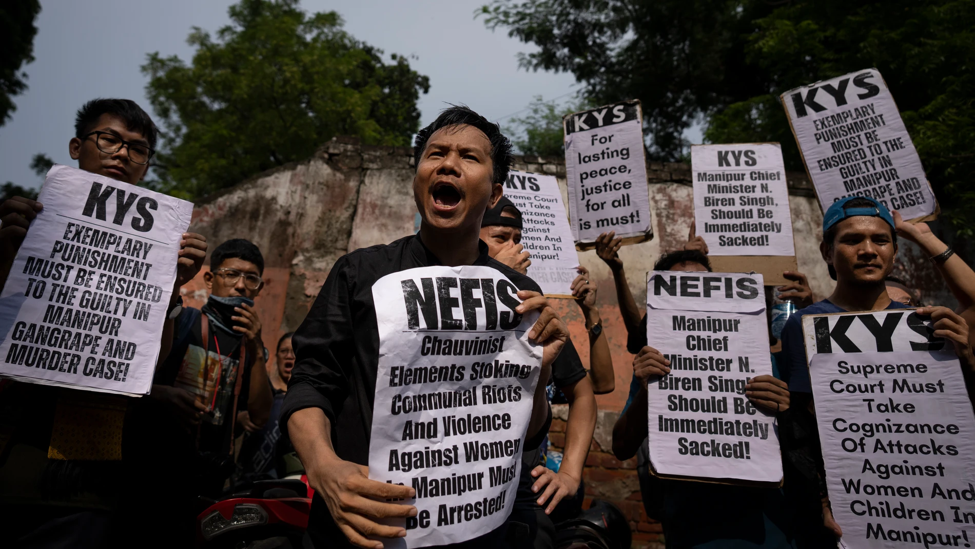 Students and activists shout slogans during a protest demonstration against the violence in the northeastern Indian state of Manipur, in New Delhi, India, Friday, July, 21, 2023. Deadly ethnic clashes in India's northeast rocked India's Parliament with the opposition blocking proceedings for a second straight day on Friday demanding the sacking of the top elected official of northeastern Manipur state where ethnic clashes have left more than 130 people dead since early May. (AP Photo/Altaf Qa...