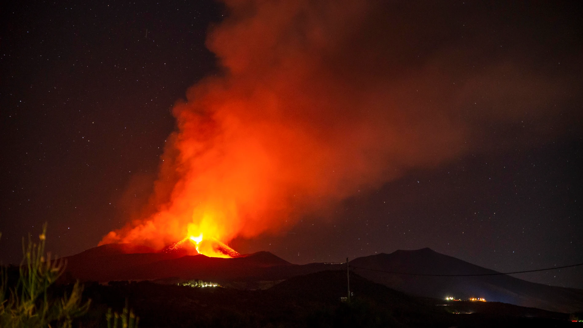 Lava flows from the Mt Etna volcano as seen from Southeast Crater, in Nicolosi, Sicily, Monday, Aug. 14, 2023. (AP Photo/Salvatore Allegra)