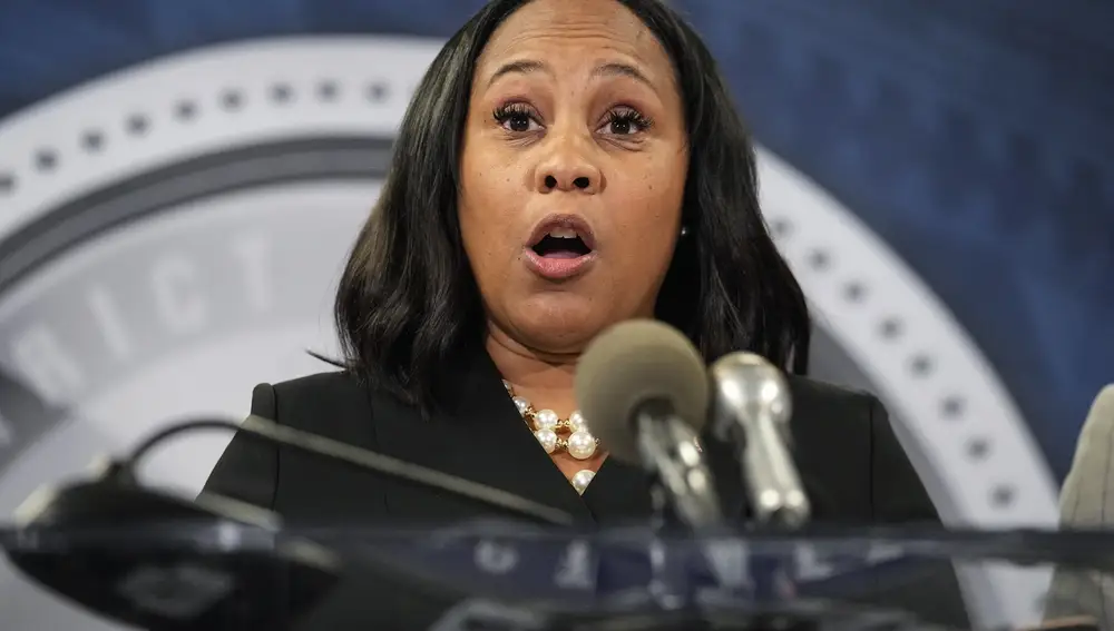 Fulton County District Attorney Fani Willis speaks in the Fulton County Government Center during a news conference, Monday, Aug. 14, 2023, in Atlanta. Donald Trump and several allies have been indicted in Georgia over efforts to overturn his 2020 election loss in the state.