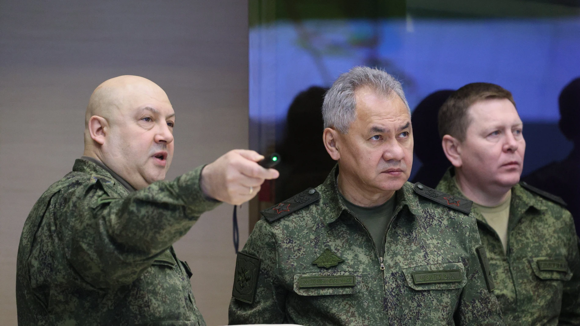 General Sergei Surovikin (L), commander of Russia's military operation in Ukraine, and Russian Defence Minister Sergei Shoigu (C) during a visit by Russian President Putin to the joint headquarters of the military branches of the Russian armed forces involved in the 'special military operation' in Ukraine, at an undisclosed location in Russia.