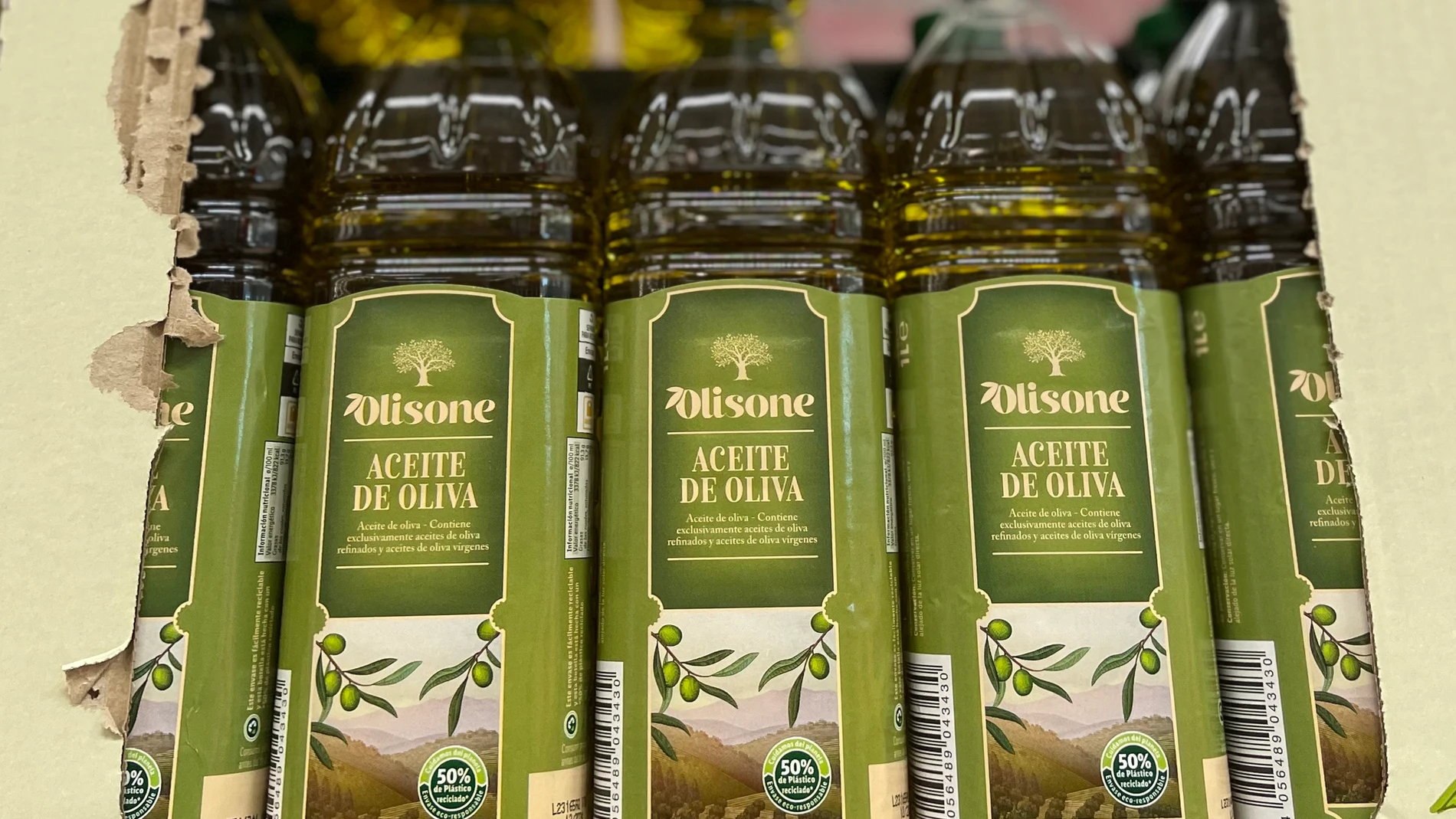 Precios de aceite. Imagen de botellas de aceite oliva y sus precios.© Jess G. Feria.