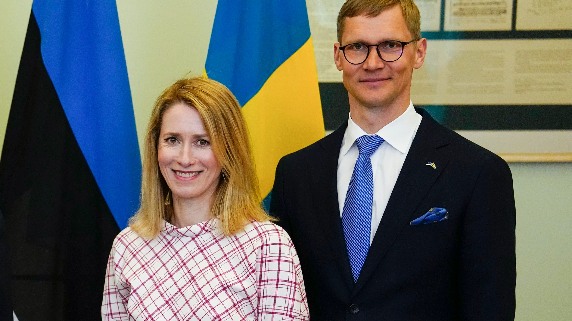 FILE - Estonian Prime Minister Kaja Kallas, left, and her husband Arvo Hallik pose for a picture in Tallinn, Estonia, on May 2, 2023. The husband of Estonia’s government leader said Friday Aug. 25, 2023 he will the sell stakes in a company with ties to Russia, a situation that has caused a crisis for Estonian Prime Minister Kaja Kallas, one of Europe’s most outspoken supporters of Ukraine. (AP Photo/Pavel Golovkin, File)