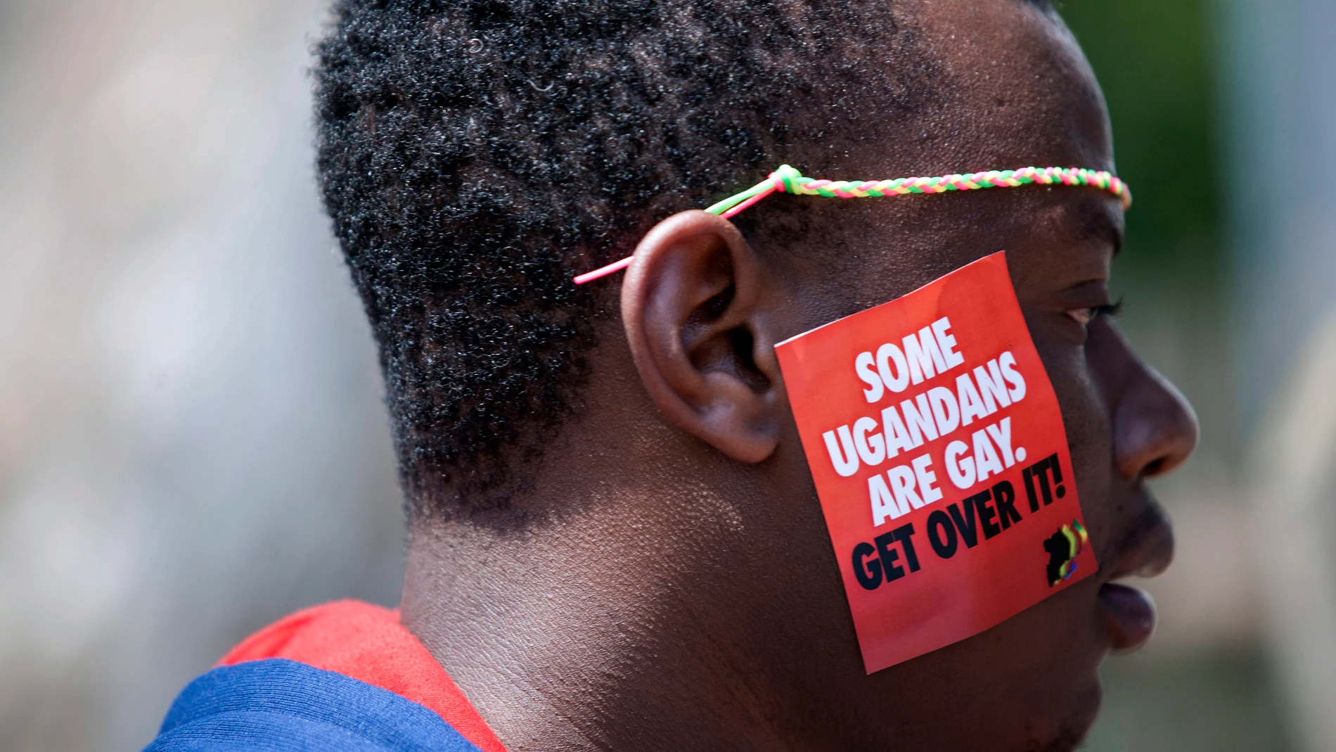 FILE - A man is seen during the third Annual Lesbian, Gay, Bisexual and Transgender (LGBT) Pride celebrations in Entebbe, Uganda on Aug. 9, 2014. Ugandan authorities have charged a man with aggravated homosexuality it was announced Tuesday, Aug, 29, 2023, which carries a possible death sentence. He is the first suspect to face the charge since the enactment in May of an anti-gay law condemned by critics as draconian. (AP Photo/Rebecca Vassie, file)