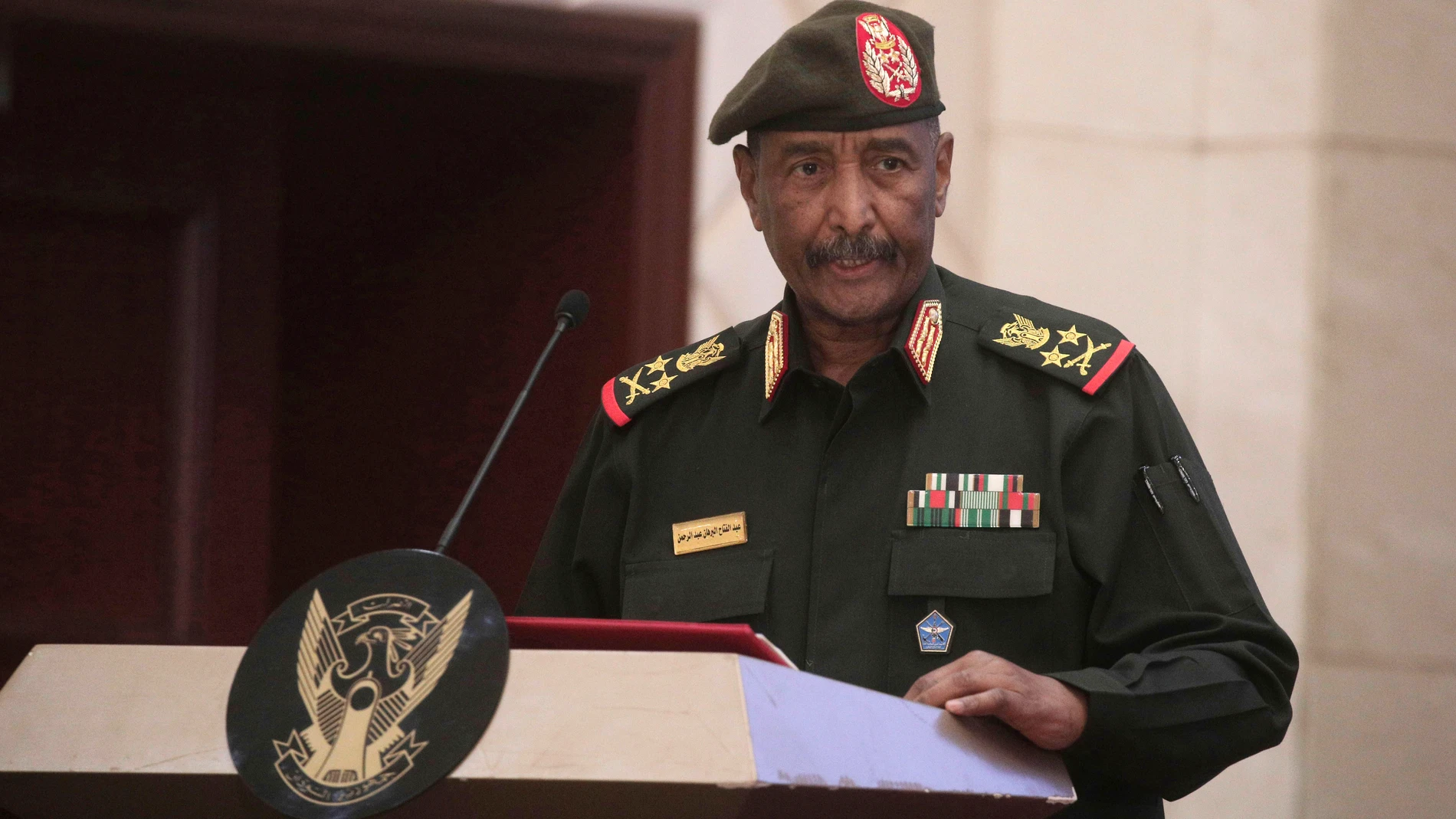 FILE - Sudan's Army chief Gen. Abdel-Fattah Burhan speaks following the signature of an initial deal aimed at ending a deep crisis caused by last year's military coup, in Khartoum, Sudan, on Dec. 5, 2022. The head of Sudan’s army warned Thursday Aug. 31, 2023 that the northeast African country will be divided if the conflict between the military and rival paramilitary force is not resolved. (AP Photo/Marwan Ali, File)