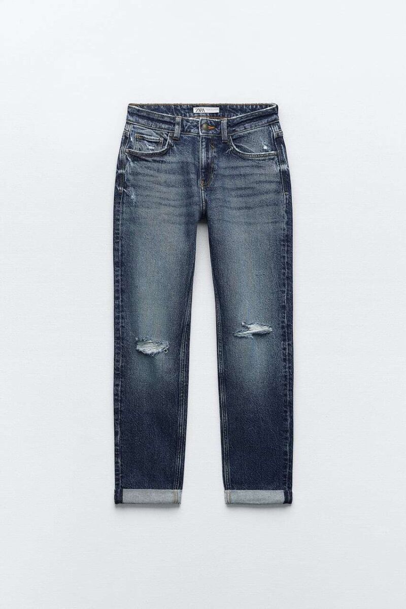Jeans tiro bajo rotos bajo vuelta
